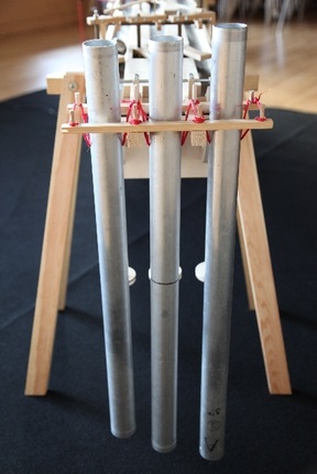 close-up of three tubular bells