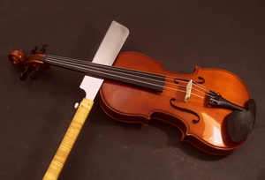 the viola being sawn apart